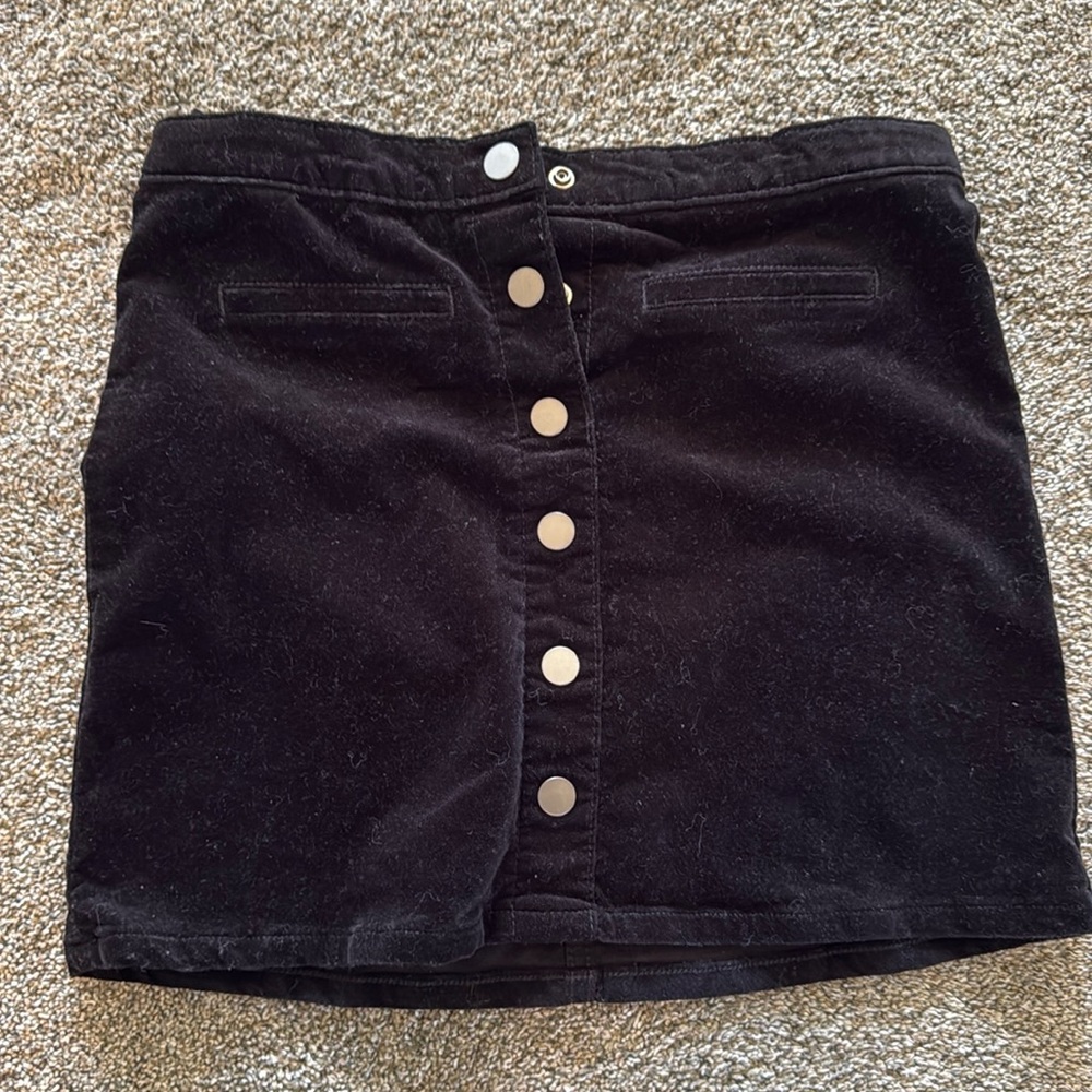 Black corduroy skirt with buttons